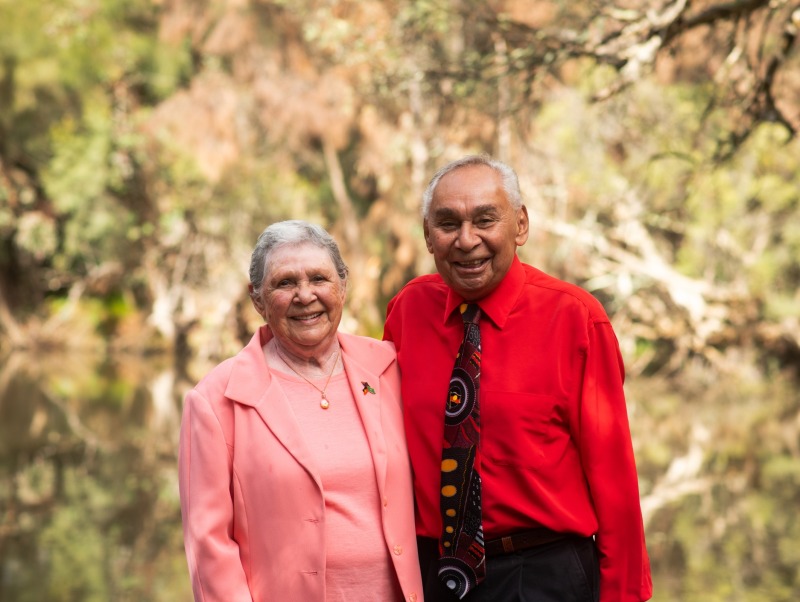 Two Elders standing together