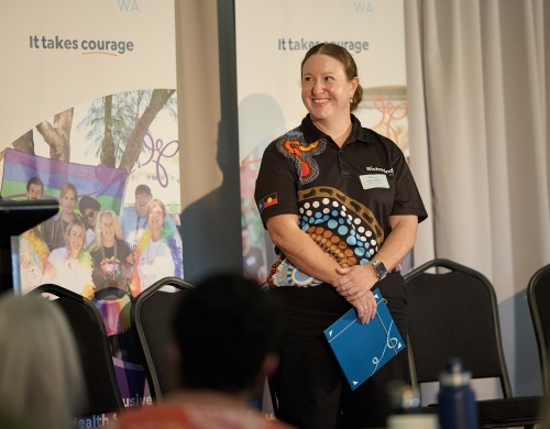 Shelley Dawson giving a talk in front of an audience at a Richmind WA event