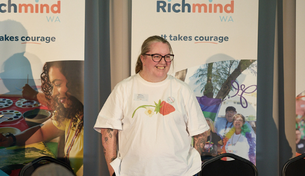 Katie Roberts speaking in front of an audience